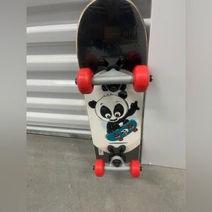Panda Skateboard with Red Wheels